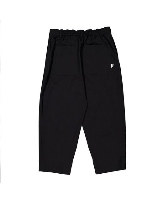 Maison Kitsuné Black Tapered Pleated Wool Trousers for men