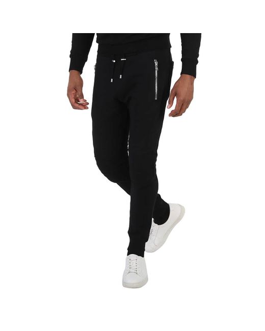 Balmain Black Embossed Logo Track Pants for men