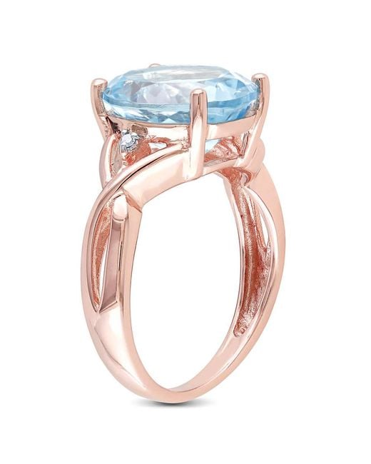 Amour Blue 5 1/2 Ct Tgw Oval Topaz And Diamond Twist Split Shank Cocktail Ring