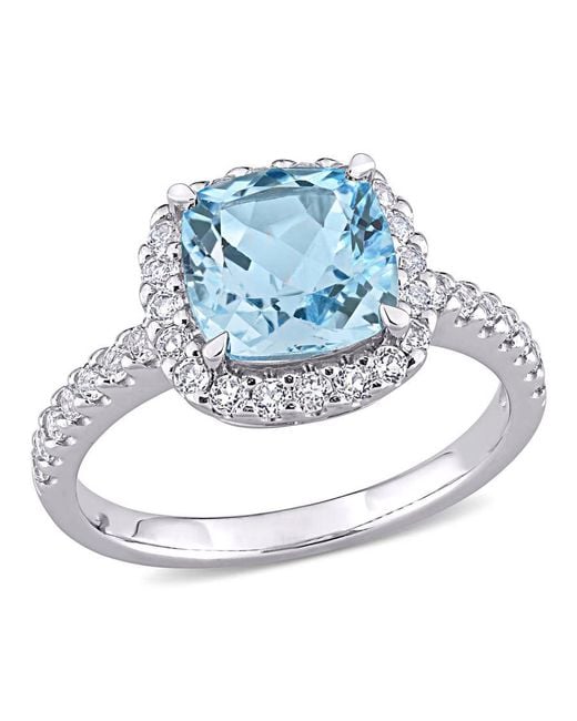 Amour Blue 3 1/2 Ct Tgw Sky- Topaz And Topaz Halo Ring
