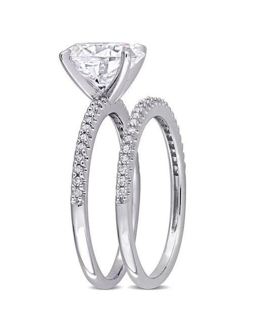 Amour Metallic 2 Ct Dew Oval Created Moissanite And 1/4 Ct Tw Diamond Bridal Ring Set