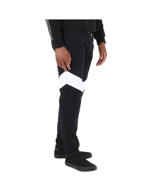 Balmain Black Monogram-patch Cotton joggers for men