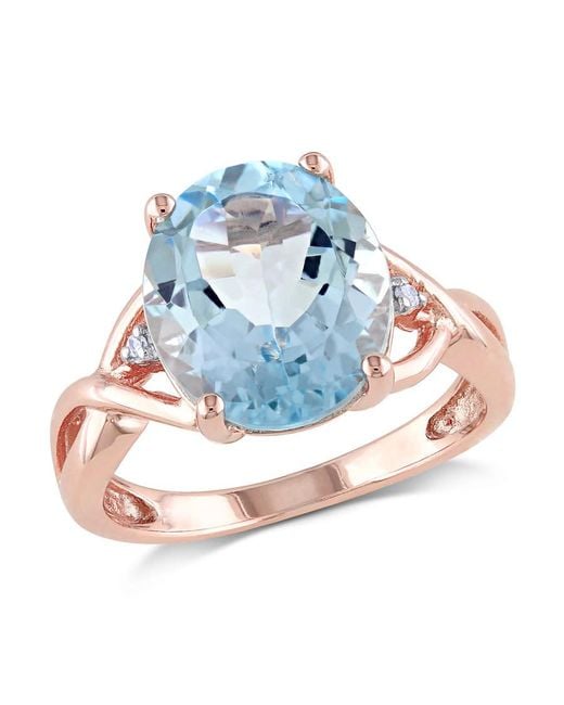 Amour Blue 5 1/2 Ct Tgw Oval Topaz And Diamond Twist Split Shank Cocktail Ring