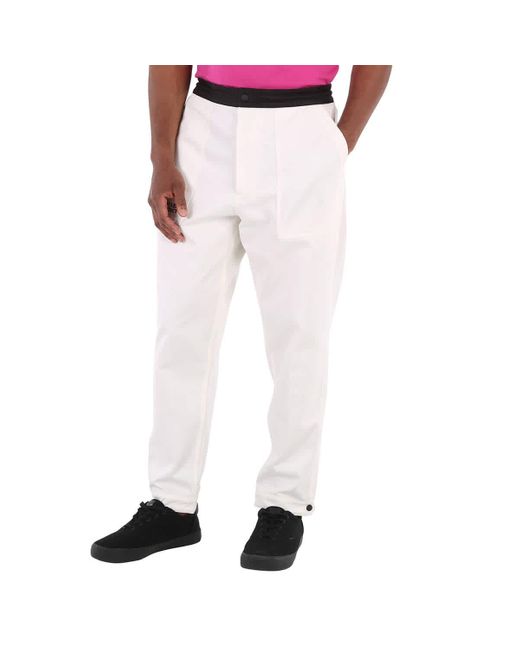 Moncler White Logo Embroidered Cotton Tapered Trousers for men