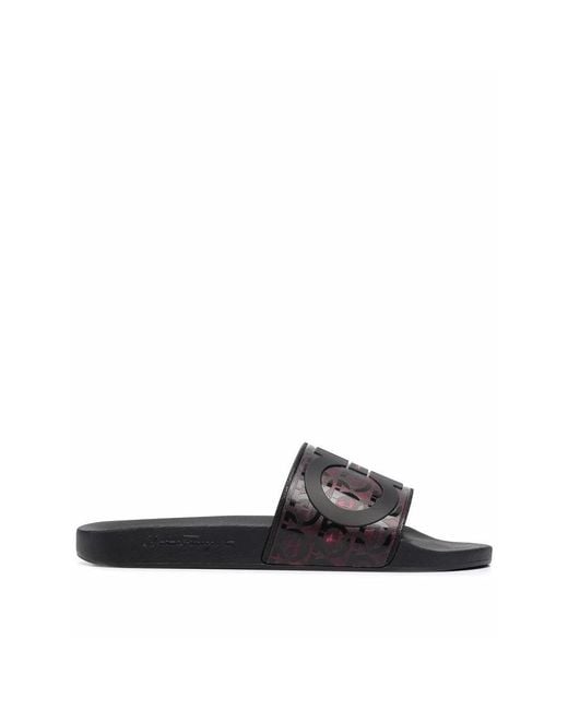 Ferragamo Black Groove Logo-Embossed Sliders for men