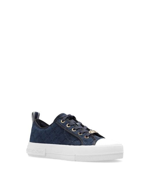 Michael Kors Navy Logo Embossed Evy Empire Sneakers in Blue Lyst UK
