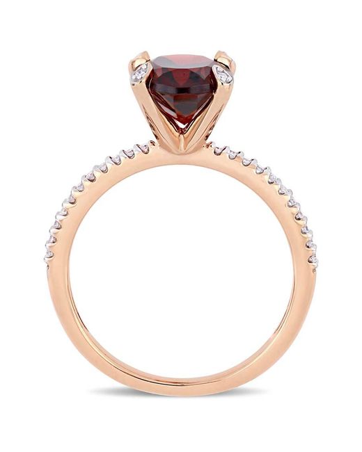 Amour Red 3 Ct Tgw Oval-Cut Garnet And 1/10 Ct Tw Diamond Ring