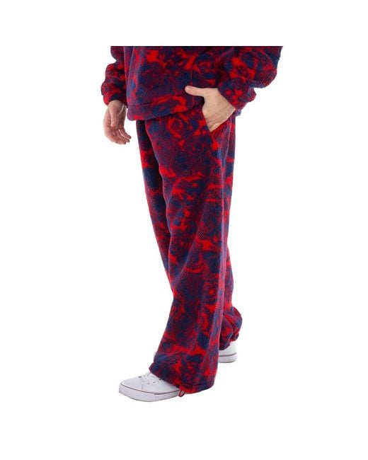 Burberry Red Rose Print Fleece Trousers for men