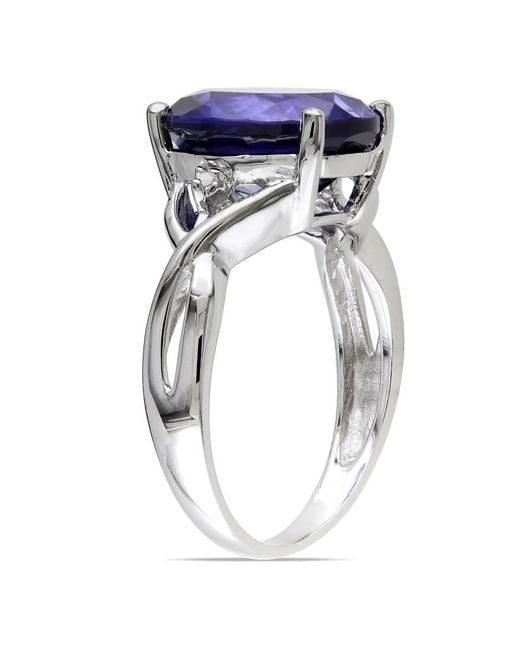 Amour Blue 7 1/2 Ct Tgw Oval Cut Created Sapphire And Diamond Accent Ring