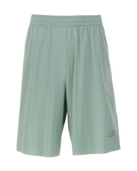 Bermuda X Salomon di MM6 by Maison Martin Margiela in Green da Uomo