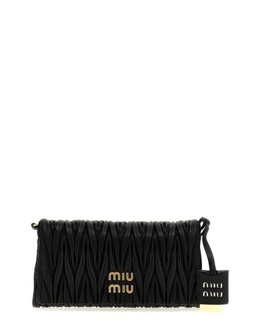 Pochette matelassé logo di Miu Miu in Black