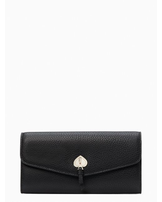 kate spade spencer slim flap wallet
