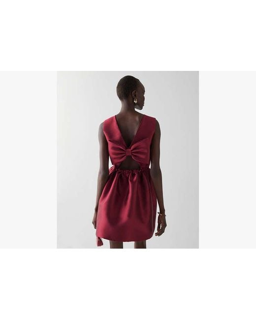 bow back fit and flare dress kate spade Kate Spade Bow-Embellished Open Back Mini Dress