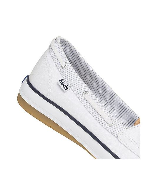 keds boat shoes white