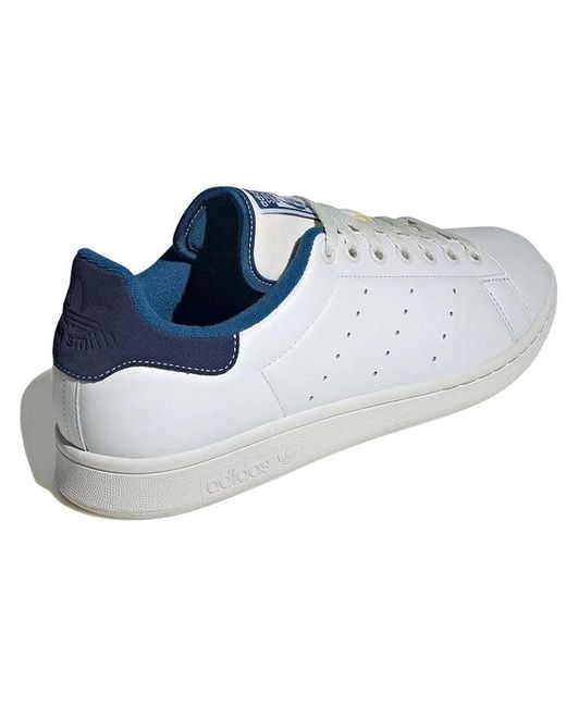 Stan smith white and blue hotsell