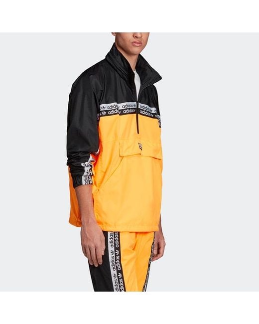 adidas Originals Ryv Vocal Neon Tt 1/4 Zip Hidden Hoodie Jacket in