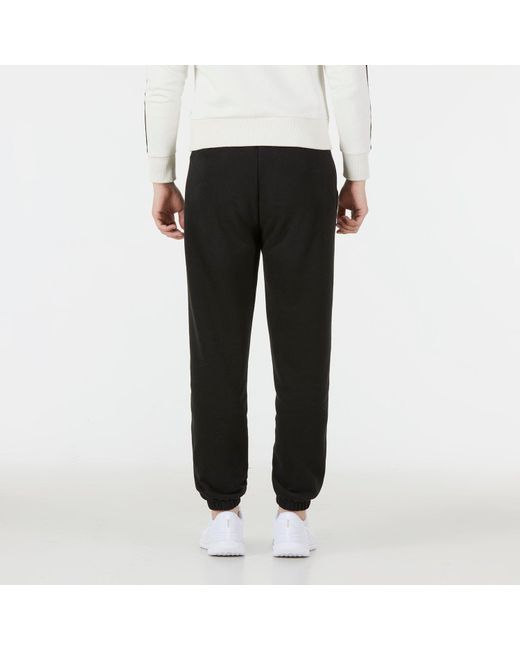 PUMA Black Ess+ Relaxed Sweatpants for men