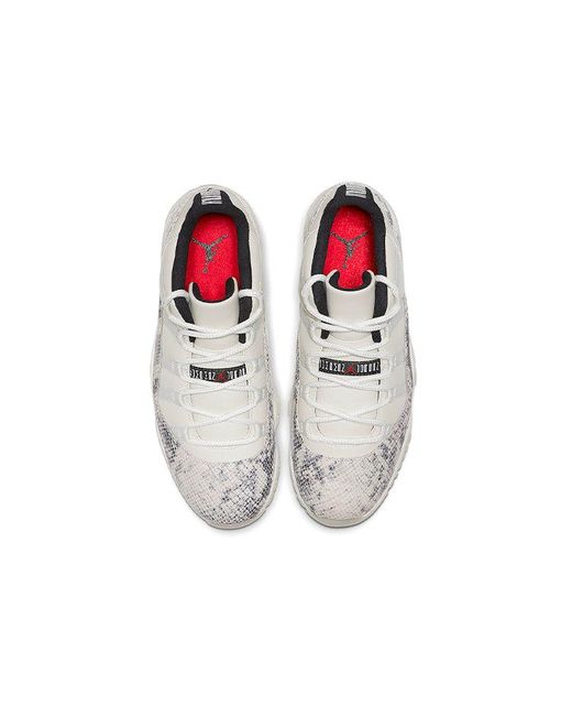 Nike White 11 Retro Low 'Light Bone Snakeskin' for men