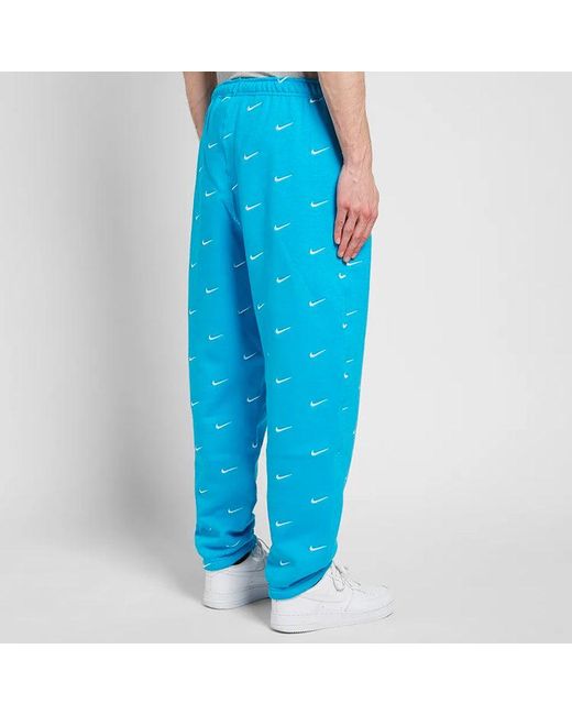 Nike Blue Nrg Swoosh Logo Full Print Straight Sports Pants/Trousers/Joggers for men