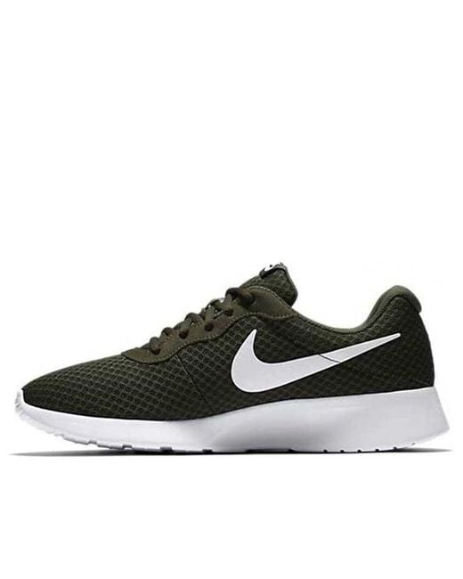 Nike tanjun shop green mens