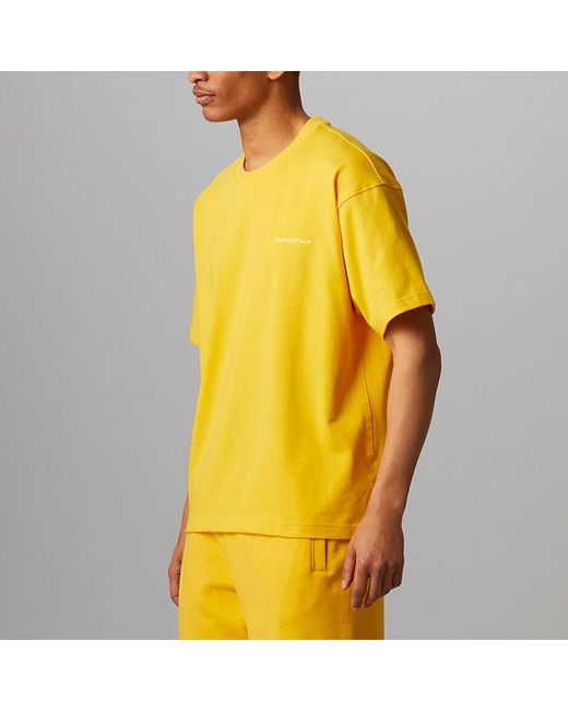 Adidas Originals X Pharrell Williams Crossover Casual Breathable Sports Solid Color Short Sleeve Yellow T-shirt for men
