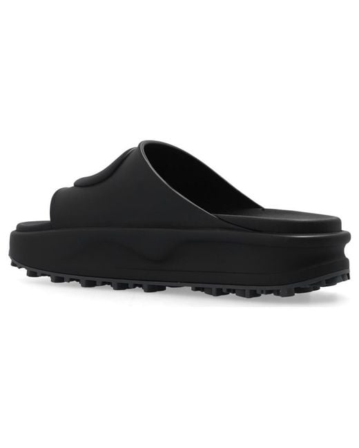 Gucci Black Miami Logo-embossed Rubber Sliders for men
