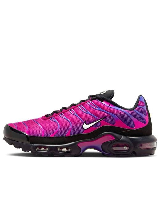 purple nike air max plus sneakers