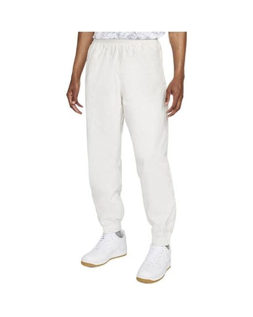 Nike White Solid Color Logo Printing Elastic Waistband Bundle Feet Sports Pants/Trousers/Joggers Autumn for men