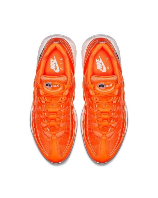 orange nike 95s