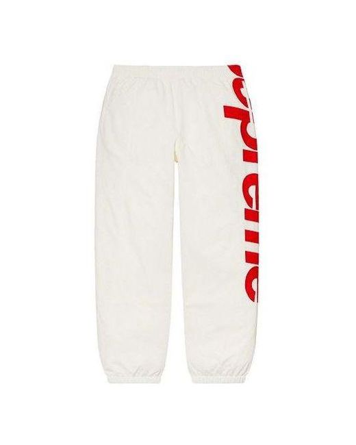 Supreme White Spellout Track Pants for men