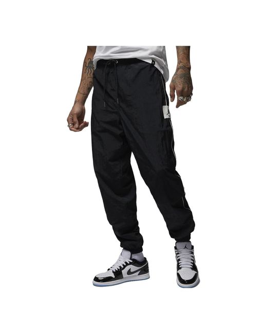 Nike Black Essential Woven Flight Warm-up Pants for men