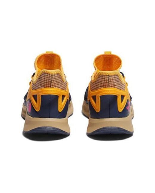 The North Face Yellow Oxeye Tech Running Shoes for men