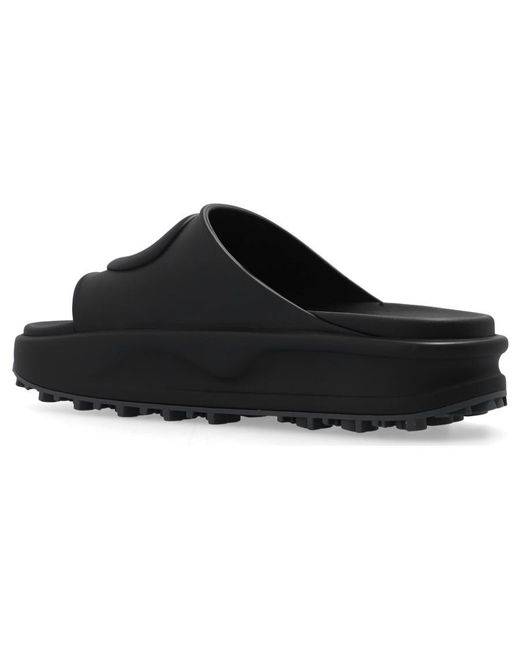 Gucci Black Miami Logo-embossed Rubber Sliders for men