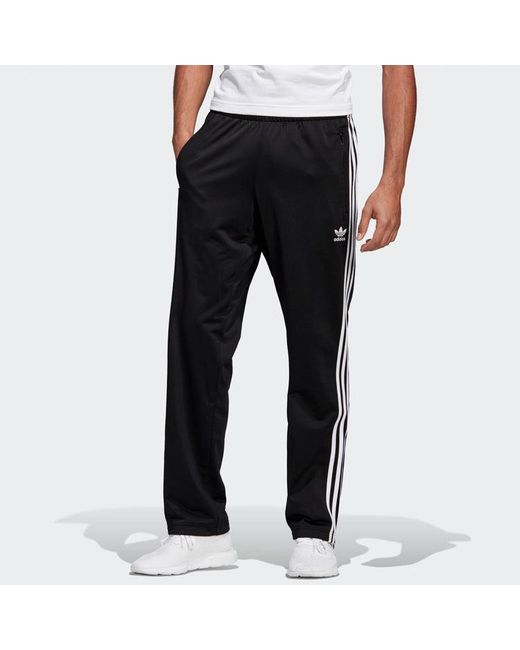 Adidas Black Firebird Tech Track Pants for men
