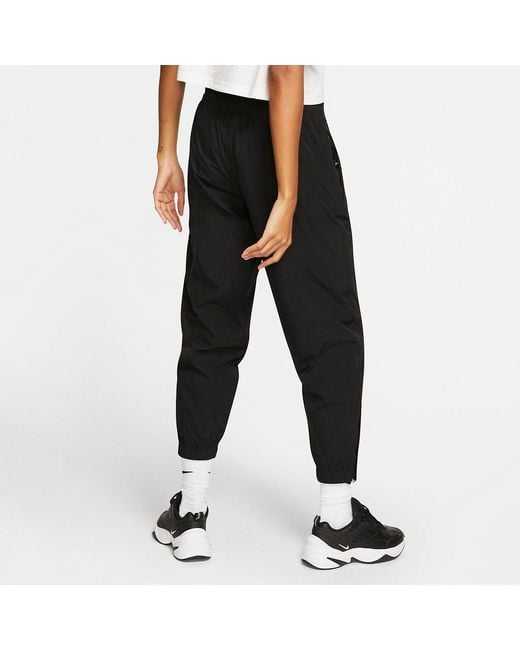 Nike Black (Wmns) Nrg Solo Swoosh Track Pants Asia Sizing