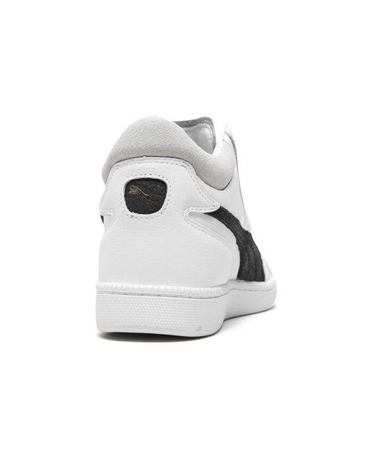 PUMA White Becker Mid for men
