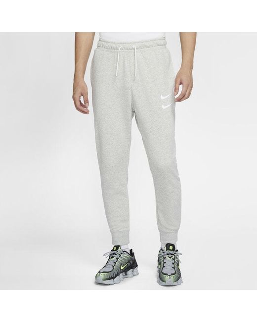 Nike Gray Sportswear Swoosh Logo Slim Fit Bundle Feet Sports Long Pants for men