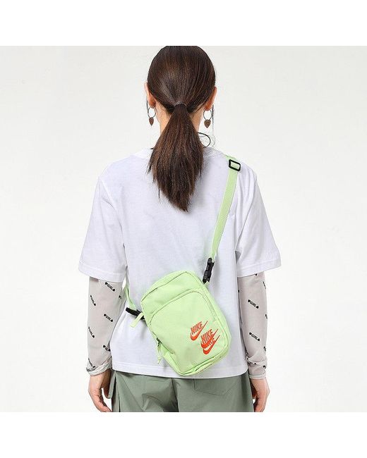 Nike gray × neon green sling bag Nike Sportswear Commute Sling Bag (9L). Nike ID