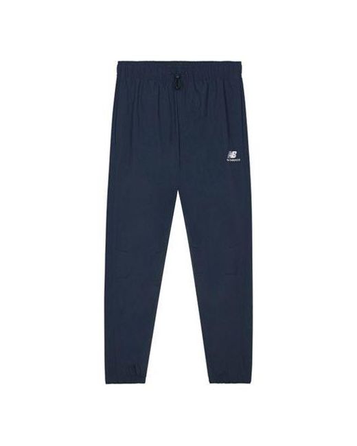 New Balance Blue Athletics Higher Learning Wind Pants for men