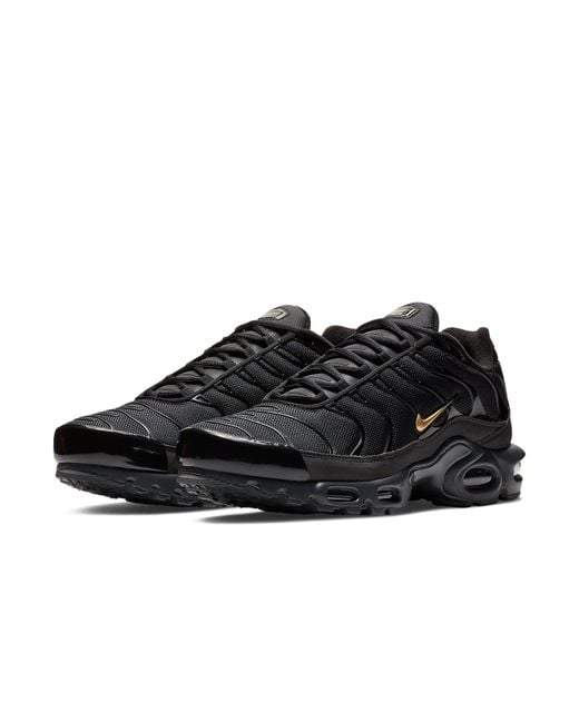 nike air max plus men's black and gold