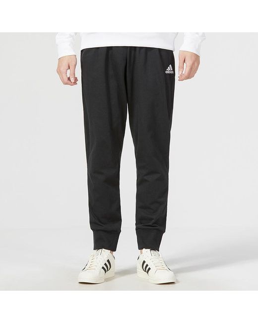 Adidas Black Essentials Logo Track Pants for men