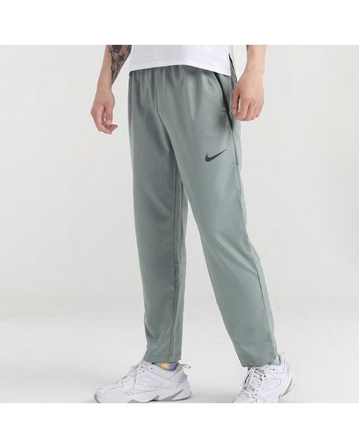 Nike Blue Team Woven Tattingcasual Long Pants for men