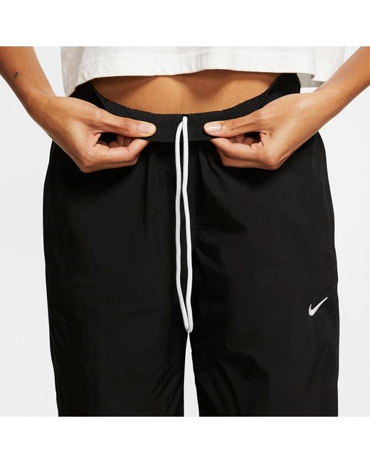 Nike Black (Wmns) Nrg Solo Swoosh Track Pants Asia Sizing