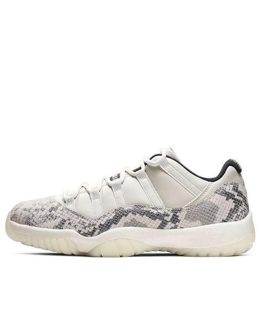Nike White 11 Retro Low 'Light Bone Snakeskin' for men