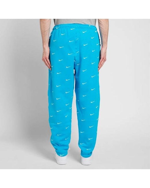 Nike Blue Nrg Swoosh Logo Full Print Straight Sports Pants/Trousers/Joggers for men