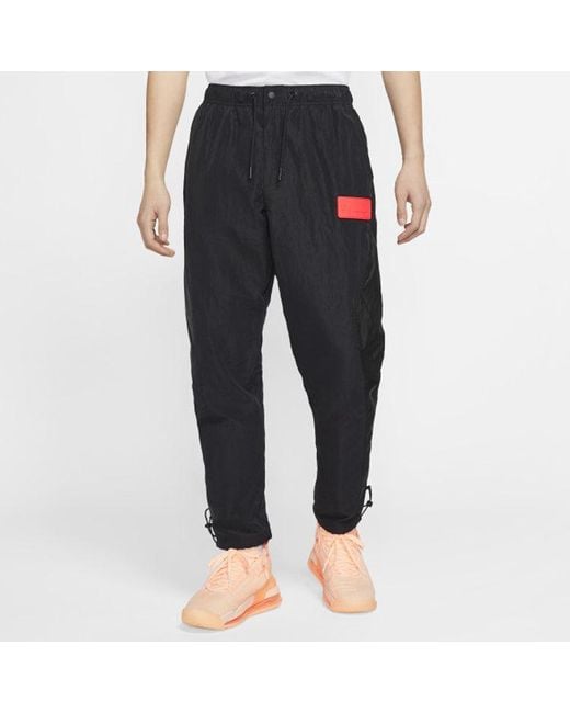 Nike Gray 23 Engineered Zipper Ankle Banded Sport Tat Pant for men