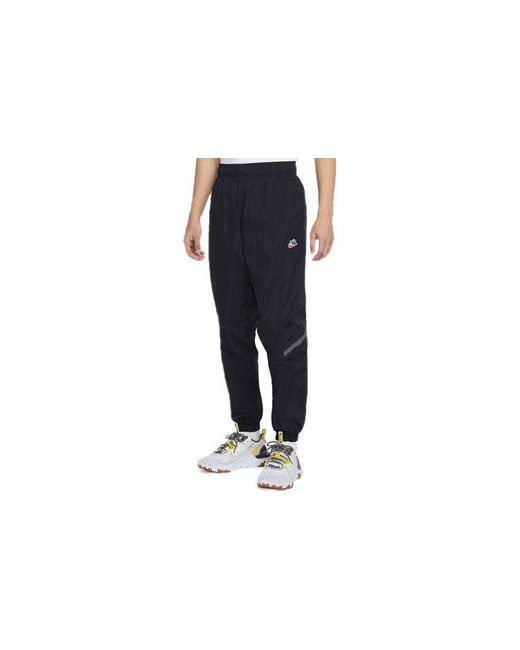 Nike Black Sportswear Windrunner Woven Breathable Bundle Feet Sports Long Pants for men