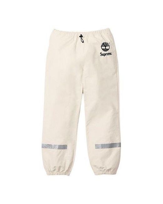 Supreme Natural X Timberland Reflective Taping Track Pants for men