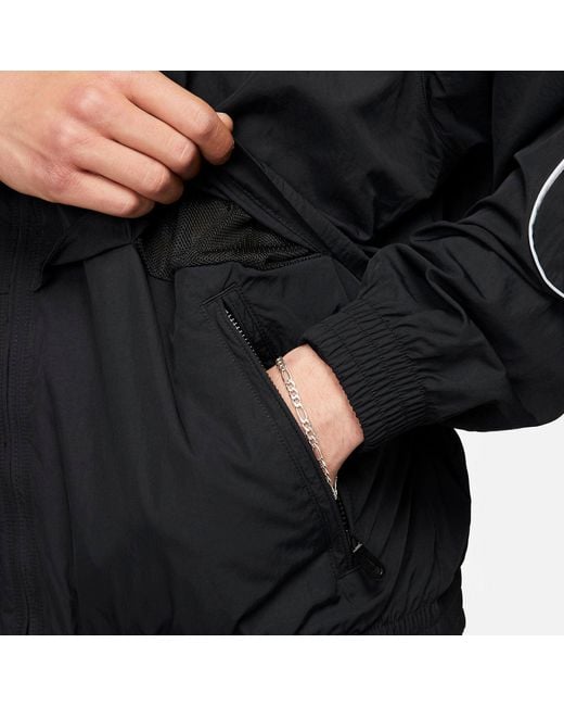 Nike Black Solo Swoosh Woven Track Jackets for men