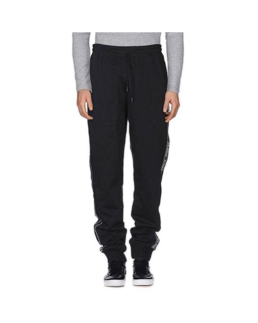 Off-White c/o Virgil Abloh Black Side Stripe Pants for men